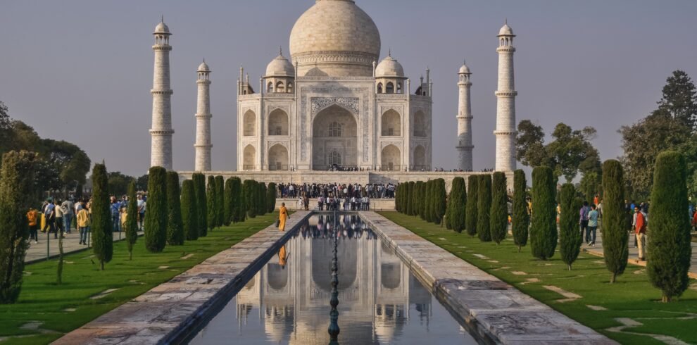 A picturesque view of the Taj Mahal, reflecting the beauty of the Agra Taj Mahal Tours